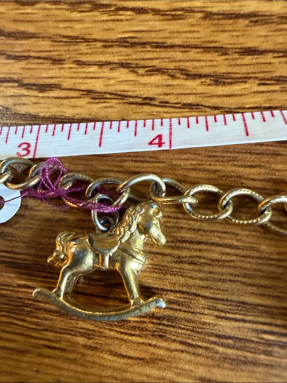 Avon Gold-Tone Toy Charm Bracelet with Rocking Horse & Teddy